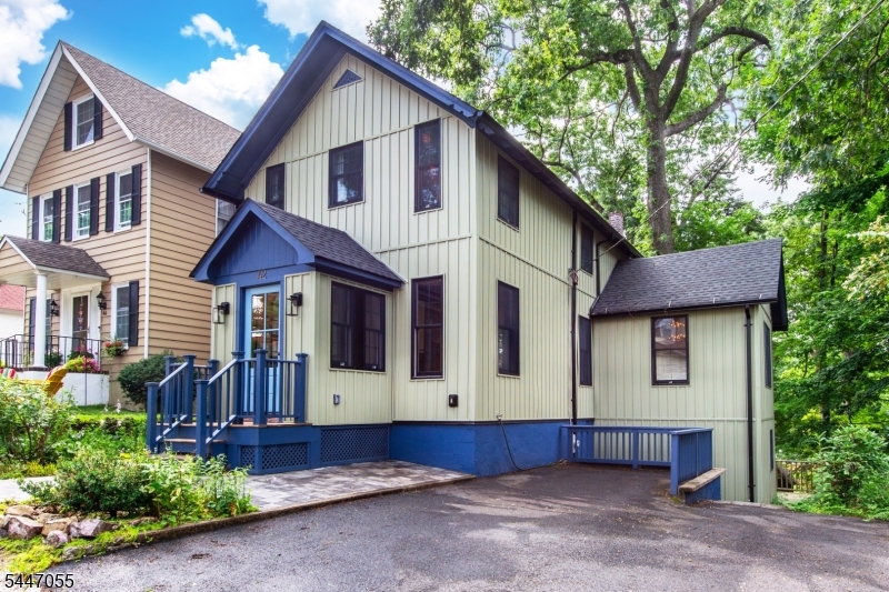 Classic Charm meets Modern Living in this beautifully reimagined Victorian Cottage taken down to the studs & thoughtfully renovated. Newly sided Board & Batten replicating its original form. From the moment you arrive through The Enclosed Vestibule, the character shines! Expansive Double Solid Wood Doors is a gorgeous nod to its Heritage. The Main Level is designed for the way you live today with an Open-Concept Layout that flows effortlessly from Living & Dining  Areas into a Bright Modern Kitchen. A Powder Room is tucked neatly beneath the stairs & just off the dining room, a back deck invites you to unwind & enjoy the outdoors. Upstairs you will find two comfortable bedrooms plus a versatile third room-the perfect canvas for a home office, sitting room or closet. All three share a Full Bath complete with a Deep Soaking Tub made for relaxing. The Finished Lower Level adds even more flexibility offering a third bedroom & second generous living space, Laundry Room & additional full bath. Additional Entrance on the Lower Level lead to an Open Porch, Backyard & Driveway access. The Driveway Parking for three is a rare coveted luxury-as any Tabor local will tell you! PLUS, EV Charger.  Set just steps to Mount Tabor Country Club, parks & playgrounds, walking trails, post office, library & Historic Tabernacle & Bethel Meeting Room...where Community thrives! Train station a short stroll...Welcome Home
