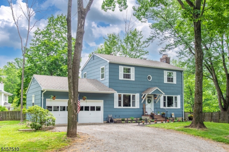 This special home is perfect for those seeking the serenity of Hunterdon County and being near a walkable small town with parks and NJ Transit train service. There's much to love about this lovely colonial with wood floors throughout. The main level has a spacious living room with fireplace and French doors to the deck, a formal dining room, half bath, and a charming kitchen with direct entry from the two-car garage. The upper level has three bedrooms, a full bath, and a window seat in the landing. The basement level has laundry, utilities, and a great amount of storage space. The partially fenced back yard can be enjoyed from the deck or patio area, and there's a spacious front yard and driveway with plenty of parking. Great location on a cul-de-sac, close access to Route 31, just around the corner from the High Bridge Hills Golf Club, and near the 1290-acre Spruce Run Recreation Area with fishing, boating, and swimming. Recent updates include lower-level Andersen replacement windows in 2022, exterior repairs and paint 2021, and interior paint 2020.