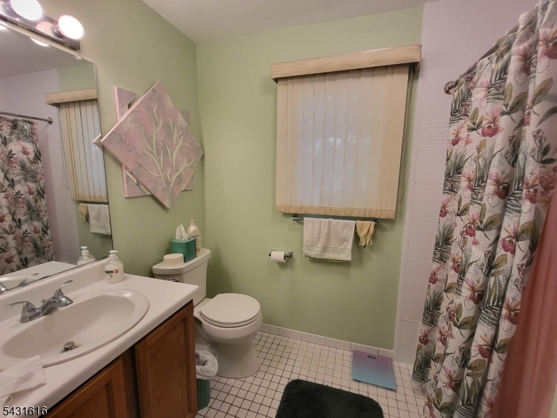 Spacious one-bedroom on the first floor! Living room has large windows and tons of storage closets. Opens to dinette area with a ceiling fan. The Kitchen includes an electric stove, refrigerator and dishwasher. Down the hall is a large bedroom that can easily host a king-sized bed, plus two closets and windows overlooking the private grounds behind the building. A large bathroom includes a shower-over-tub and its own linen closet, while a laundry closet in the hallway includes a stacking washer and dryer. Electric forced-air heat and AC. Unit includes one assigned parking space, as well as a semi-private storage area in the basement (accessible from the rear yard of the property). Over 800 square feet and in a quiet, shaded area. Excellent opportunity to build instant equity!