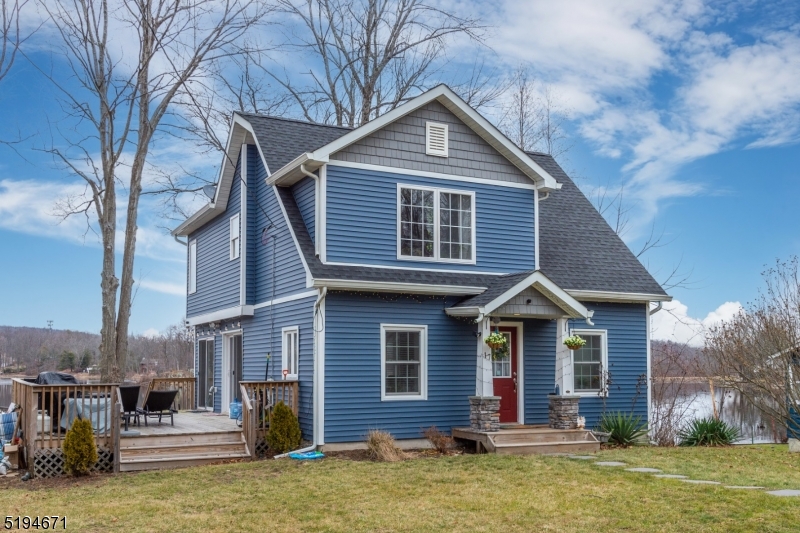 Welcome home to this immaculate lakefront home on Lake Wanda. Renovated in 2019, all there is to do is move right in! The main floor boasts an open floor plan, a full bathroom, washer & dryer. Each floor has an abundance of windows, allowing plenty of natural light and great views of the lake. The open floor plan, yard and deck makes for the perfect place to entertain. This is a great alternative to a condo/townhome, Currently, no HOA but there is a committee being formed to discuss potentially starting a home owners association. Come see it for yourself and start enjoying lake life!