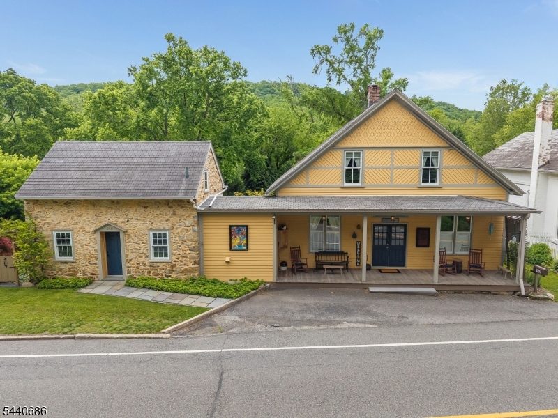 This is the HISTORIC HOME you Have Been Dreaming About!  Over the Past 20 Years, this Late 1700?s property located in the Historic Village of Finesville has been Meticulously Restored by the Owners, a Master Craftsman and Talented Decorator. Originally a General Store and Adjoining Stone Cottage, now Thoughtfully Combined into one Unique Residence Offering Flexible Living Space. Features include a Great Room with Restored Yellow Pine Floors, Multiple Flex Rooms Suitable for Office, Studio, or Bedroom use, and a second-level living area with kitchen, full bath, bedroom, and dressing space. Additional finished areas include a separate lower-level living/entertaining space with bar, sink, refrigerator, and full bath with a Soaking Tub. Radiant Heat Flooring provides added comfort. Property showcases extensive restoration with period details, Custom Millwork, Built-ins, and Modern Updates Throughout. Outdoor space offers a Beautifully Landscaped Garden Oasis, Nestled between the Delaware and Musconetcong Rivers.  Conveniently located within 1?1.5 hours of Newark, Philadelphia, and Lehigh Valley Airports, with nearby access to public transportation to NYC. The Perfect Home to Host Family and Friends as you Enjoy Local Wineries and Breweries, Outdoor Recreation, Shopping and Dining in Charming River Towns such as Milford and Frenchtown.