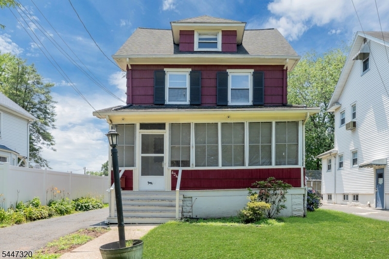 Welcome to this charming 3-bedroom, 1.5-bath Colonial, ideally situated on a quiet street just a few blocks from Warinanco Park. Enjoy the convenience of being only one block from the NYC express bus, close to the Roselle Park train station, and near Harrison Elementary School.This well-maintained home has been thoughtfully updated with numerous major improvements, including a completely resheathed and replaced roof, a sump pump with a French drain system for a dry basement, maintenance-free custom gutter guards, a high-definition security system, a new water heater, a high-efficiency Utica boiler (2015), and new vinyl windows (2025).Inside, you'll appreciate the warmth and character of beautifully refinished hardwood floors throughout both levels. The first floor offers an inviting enclosed front porch, a spacious living room, a formal dining room, a bright kitchen with a pantry, and a convenient powder room. Upstairs, you'll find three comfortable bedrooms, a full bath, and a walk-up attic offering excellent potential for future finished living space, a home office, or additional storage.Outside, enjoy a spacious, level backyard that's perfect for entertaining, gardening, or play, along with a detached garage that provides ample storage and parking. Come see!