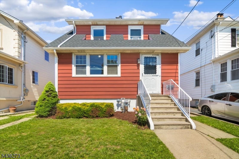 NYC Commuter's Dream Home! Beautifully maintained and perfectly located, this charming 3-bed, 2-bath home sits in one of North Arlington's most desirable neighborhoods. Enjoy unbeatable convenience with NYC transportation just a 2-minute walk from your front door, along with daycare, Foodtown, Dunkin, CVS, restaurants, and everyday essentials all within steps. The elementary school is only a 5-minute stroll away. Inside, you will find an updated kitchen with a spacious center island, hardwood floors throughout, and a versatile first-floor bonus room ideal for a home office or playroom. The home features two full bathrooms, newer appliances, and a private backyard perfect for relaxing or entertaining. A brand-new roof installed in 2025 comes with a transferable 25-year warranty for added peace of mind. Pride of ownership shines in every corner of this lovingly cared-for home. Experience the perfect blend of suburban comfort, excellent schools, and effortless NYC access all without compromising space or lifestyle.