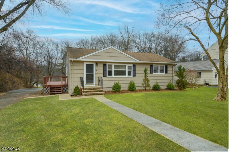 Immaculate, FULLY RENOVATED Ranch style home with finished basement, in desirable Shongum section of Randolph, close to top rated schools and minutes to the NJ Transit direct train into New York City and all that Randolph and lively Morristown have to offer. Highlights include a modern open concept, hardwood floors, abundant natural light, cordless blinds in all windows and recessed lighting.  The open layout flows into a large, sun filled living room and adjacent dining area. Gorgeous designer kitchen is equipped with quartz countertops, crisp white cabinetry, all new stainless steel appliances and a large center island with large breakfast bar peninsula. Walk out onto a nice deck overlooking private tiered backyard. Two good sized bedrooms with closets and a top of the line hall bathroom completes this level. Even more living space has been created in the basement including a large recreation room, a 3rd bedroom with a large closet, a full bathroom, a laundry room and ample storage space.  The property has a whole house generator.