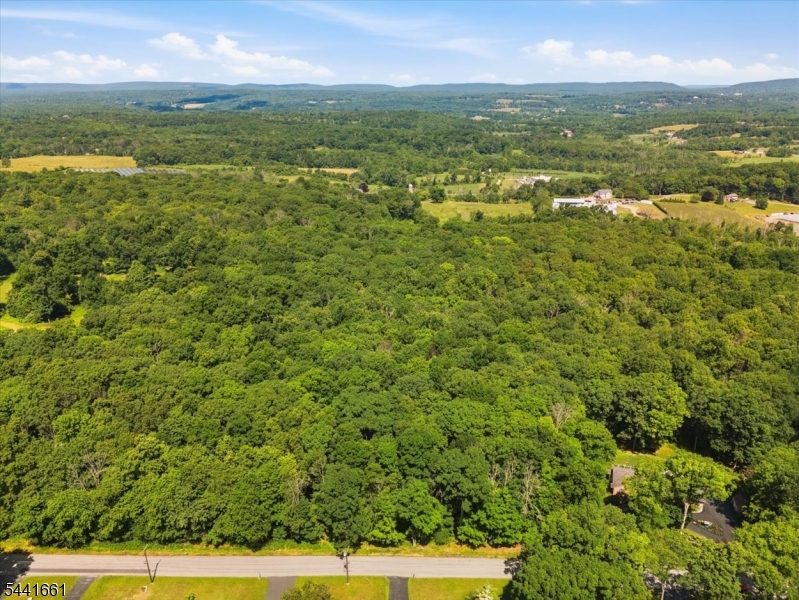 Exceptional opportunity to acquire approximately 17.6 acres of farm-assessed land in one of Sussex County's most desirable and rapidly growing communities. Offering substantial acreage, excellent frontage, and a prime Lafayette Township location, this unique property presents a rare opportunity for investors, developers, builders, and land speculators seeking a potential future subdivision or residential development project. Strategically located with convenient access to Route 94, Route 15, shopping, dining, recreational amenities, golf courses, resorts, and commuter routes, the property combines the appeal of a peaceful rural setting with proximity to modern conveniences. The expansive acreage, natural landscape, and desirable location create an attractive foundation for exploring a variety of future development possibilities. The property's size and configuration may offer potential for subdivision and residential development, subject to all municipal approvals, zoning requirements, environmental considerations, and buyer due diligence. With large tracts of undeveloped land becoming increasingly scarce in Lafayette Township, opportunities of this scale are rarely available. Whether you're a developer looking to explore a future residential community, an investor seeking long-term appreciation, or a buyer looking to secure a significant land holding in a highly sought-after market, this property offers exceptional potential and flexibility. Buyer responsible for conducting all due diligence.