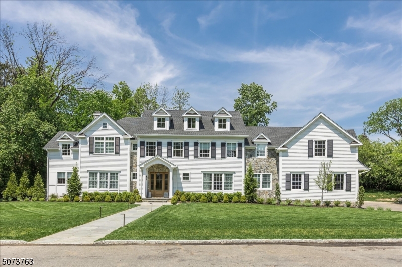 Masterful design is uniquely embodied in this luxurious high end smart home.Resting on over a half an acre & offering 9,000 sf of living space, this beautiful home is outfitted w/ 7 beds & 6.5 baths. Two-story foyer & new white oak herringbone floors lead into generously sized formal dining & living room.Bright family room w/ double sided marble gas fireplace & access to the covered porch.First floor office accented w/ custom wall coverings & access to outside.Chef's kitchen w/custom cabinetry, quartz countertops, high end appliances, walk-in pantry & large island.Master wing w/ double sided gas fireplace, sitting room, his & her dressing quarters & spa -like bath.Finished basement w/ rec room, gym, screening room, full bath & guest room.Outside is the expansive bluestone patio & new heated gunite pool.