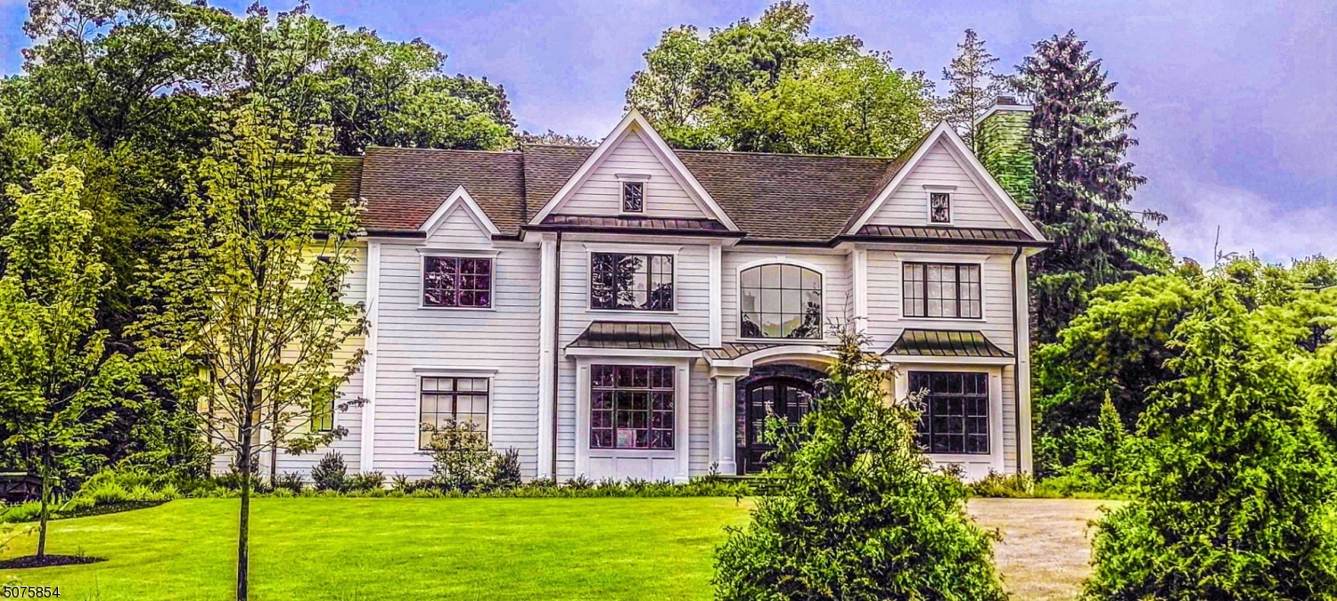 Looking for a lot & location that you don't have to compromise your custom home design or exterior plans? Here it is! Gorgeous and stately home on 125 x 357 lot (Over an acre) located on quite street with Brooklake Country Club views. 5,100 sq ft with additional 1,900 in the finished basement for a total of 7,000 sq ft. This home features Large gourmet kitchen and family rooms, two stair cases, 1st floor ensuite, 5 bedrooms w/ 5 full baths on 2nd floor, 3 car garage and much more. Large, finished basement with rec room, exercise room and more! Established   high end, Florham Park builder with all high quality materials. Work with a builder and designer with years of experience to build your dream home that you customize!