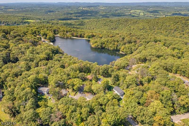Welcome to Lake Panorama! Fantastic opportunity to own land in this beautiful Lake Community, with the potential to build. This lot offers a beautiful setting and great access to all that Lake Panorama has to offer. Bonus Opportunity: The adjacent lot at 5 Splitrock Lane is also available! Sellers are open to bundling both lots for a discounted price if purchased together, don't miss this chance to expand your space and save. Whether you're looking to invest, build, or simply enjoy the lake lifestyle, this is a deal worth exploring!