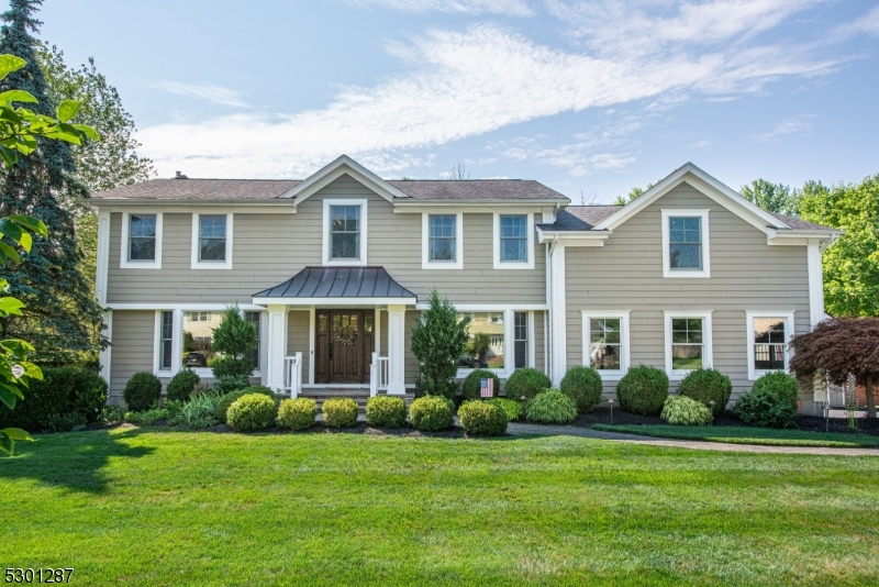 EXCEPTIONAL Shongum Lake Expanded Braddock Model Colonial on the Canal w/ Dock! This Magnificent Home was extensively remodeled & expanded and features a well thought-out open concept floor plan & HIGH-END FINISHES! Walk in through the Beautiful Front Portico into a large Great Room w/ Gas Fireplace, Slider to a NEW Composite DECK overlooking the beautiful flat backyard. The gorgeous white Kitchen features Mouser Cabinetry, Delicatus white granite counters & backsplash, a Farmhouse Apron Sink, Miele Appliances, a Scotsman Ice Maker, SubZero fridge, Viking Wall Ovens & Warming Drawer. Two Large Pantries. Dining Room w/ built-ins. The mudroom is conveniently off the kitchen & garage. Upstairs you find 5 large bedrooms & two exquisite remodeled baths. The expanded Primary Suite features 3 Large Closets and a luxurious Bath. The basement was just recently partially finished and features a Family Room & Exercise Room. The Exterior features Hardie Board siding, Azek trim, copper roofing accents, blue stone portico & a full house natural gas generator. The grounds have extensive plantings, a storage shed & a playhouse, & sprinkler system. Hop onto the canoe right from your own dock and ride out to the lake! The Shongum Lake Community features a clubhouse, beach, boating, swimming, and a full calendar of social events. Public utilities. Award-winning Randolph Schools. Close to highways and public transportation. Don't miss this STUNNING Home! Ask for list of upgrades!