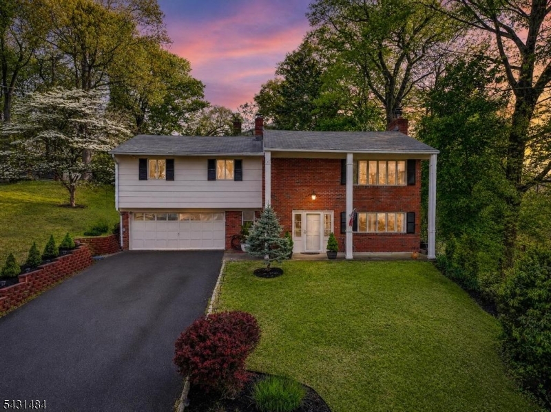 Welcome to the desirable Elba Point section of Hopatcong, where everyday living meets a year-round lake lifestyle with a community beach club and marina minutes away. Set on approximately .20 acres, this spacious 4-bedroom, 3-bath bi-level offers approximately 2,176 square feet designed for both comfort and flexibility. High ceilings, beam accents, skylights, and a wood-burning fireplace create warmth and character throughout the home, while the versatile layout offers ideal space for guest accomodations, flexible lower-level living or today's work-from-home needs. The home also features an eat-in kitchen, formal dining room, ductless split A/C, public water, a 2-car attached garage with inside entrance, deck, workshop area, storage shed, and generator hookup.Located in the Elba Point lake community near the Elba Point Beach Club and marina area, residents have the opportunity to enjoy optional membership access to beach, boating, swimming, and community activities. Lake Hopatcong   New Jersey's largest lake   is known for its vibrant boating lifestyle, offering opportunities for power boating, pontoon cruising, jet skiing, kayaking, fishing, and waterfront dining. Spend weekends exploring lakeside restaurants, marinas, and scenic coves, all while enjoying the convenience of nearby shopping, commuter routes, and Hopatcong State Park. This home offers the perfect blend of space, lifestyle, and year-round recreation in one of the area's most sought-after lake communities.