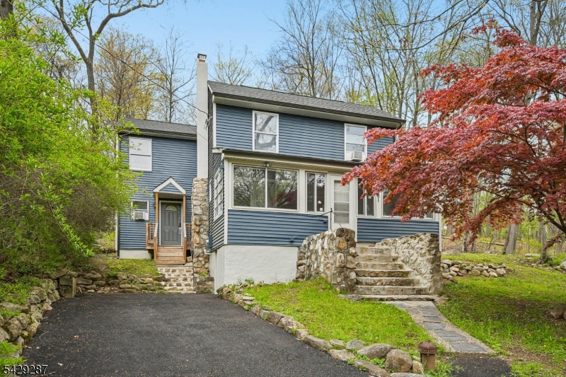 Welcome to this beautifully updated 3-bedroom, 2-bath Colonial offering almost 2,000 sq ft of living space in the highly desirable Landing section of Mount Arlington! The main level offers comfortable living and entertaining spaces, while the second floor provides three spacious bedrooms and full bath accommodations. Conveniently located near Lake Hopatcong, shopping, restaurants, major highways, NJ Transit.  A wonderful opportunity to own in one of Morris County's most sought-after lake communities. Major upgrades include a brand-new roof, windows, siding, electrical, plumbing, and a high-efficiency heating and cooling system, providing both peace of mind and long-term value.