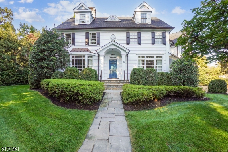 Better than new construction!!  This custom home was built by highly-regarded, local builder, Will Lloyd. Impeccably maintained and updated, this 7 BR, 5FB, 1 half bath is situated in Madison's sought-after Hill Section. Sophisticatedly designed, the main level has a large DR with gorgeous moulding, an inviting living room with a gas fireplace and built-ins. Off of the living room is a sitting room that is sun-drenched with transome windows on three walls. The office with built in desk is a perfect retreat for work calls. Custom white cabinets, center island, sub zero refrigerator and wolf ovens and stove surround the eat-in kitchen and make this mission control for busy life styles. Perfect for entertaining; the bar area houses a wine refrigerator, ice machine & 2 refrigerator drawers conveniently positioned between the kitchen and the family room. An incredible family room with a gas fireplace, custom desk area for homework and french doors leading out to the bluestone patio and backyard.  The attention to detail is not forgotten in the walk out basement. High ceilings and a gas fireplace make this level a perfect second family room. An impressive wine room with chiller, can house an extensive wine collection. Additionally, this level has a bedroom, full bathroom with steam and a separate exercise room. Walk directly into the heated 2 car oversized garage. Finished 3rd floor has a bedroom, full bath, family room/office, cedar closet and storage. Special features to include: