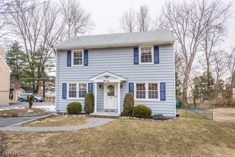 Great 3 bedroom 1 1/2 bath colonial in a picture perfect Cedar Knolls neighborhood. With hardwood floors and lots of natural light, this is an ideal home. The main floor has a spacious living room, and a dining room which is open to the kitchen. The den is currently used as a playroom and there is also a powder room on the main floor. Upstairs is a full bathroom and 3 spacious bedrooms all with good closet space. The basement offers lots of additional storage and potential to finish. The spacious deck overlooks the flat, and fully fenced in backyard. Cedar Knolls has relatively low taxes and exceptional schools. Additionally, with its proximity to restaurants, shopping, parks as well as being close to major highways this is a house you don't want to miss.