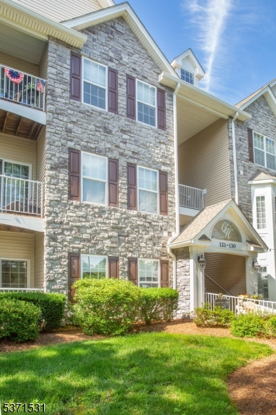 Welcome to 130 Barrister Drive, a meticulously maintained townhome in the prestigious gated community of Cambridge Heights.This bright & stylish home offers the perfect blend of comfort & convenience. The open-concept living space features soaring vaulted ceilings, gleaming hardwood floors, & a stunning stacked-stone gas fireplace that adds warmth & charm.A large sliding glass door leads to your private balcony ideal for morning coffee or evening relaxation. The updated kitchen boasts crisp white cabinetry, granite countertops, stainless steel appliances, & a convenient breakfast bar perfect for casual dining.Formal dining area flows seamlessly from the kitchen, making entertaining a breeze. The spacious primary suite features a tray ceiling, large walk-in closet, & spa-like bath w/modern fixtures. A second bedroom showcases a chic accent wall & oversized window that fills the space w/natural light.The stylish main bathroom has been completely renovated w/designer touches, while a large finished loft offers versatile bonus space for a home office, playroom, or guest retreat. With in-unit laundry, & ample storage, this home has it all. Enjoy the ease of low-maintenance living w/resort-style amenities; clubhouse, pool, & gym. Minutes from Rt. 23, shopping, dining, & NYC transportation this home offers the lifestyle you've been searching for.Don't miss your chance to live in one of Butler's most sought-after communities! Sale contingent on seller finding a home.Actively looking.