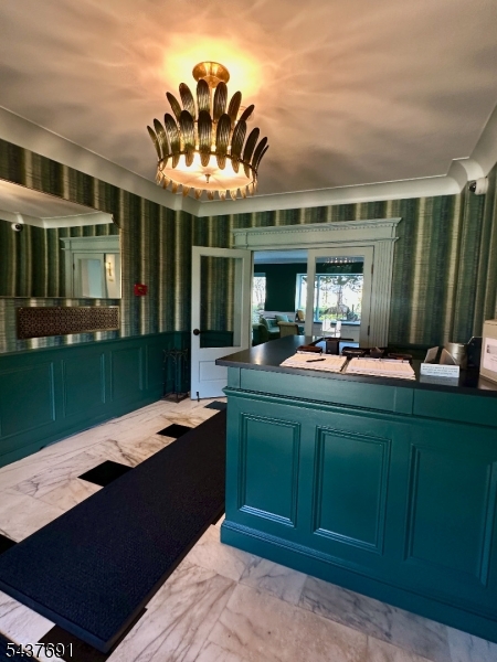 Super value to live in Montclair's only co-op building! The Rockcliffe is an elegant, Georgian-style pre-war building located atop First Mountain in a park-like setting with patio and fountain. This beautiful one bedroom, one bathroom unit with a NY skyline view features a renovated kitchen and bathroom, granite countertops, updated appliances, parquet and herringbone floors, built-in bookshelves and custom closet system. Walk to NYC bus, downtown stores, movie theater and Montclair Art museum for a monthly maintenance fee of $1284. This fee includes heat, hot water, gas, sewer, trash, 24-hour concierge service, live-in super, maintenance of common areas and property taxes - 37% deductible. Laundry rooms on premises, parking outdoors $35./month and garage parking $60./month (if available), storage unit (waitlist).
