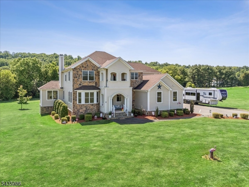 Embrace the Tranquility, Privacy & Modern Luxury -This Like-New Center Hall Colonial Built 2019 w/Over 3 Beautifully Level Acres at the End of a Quiet Cul-De-Sac, This Exceptional 4/5 BR, 4 Full Bath Center Hall Colonial Offers the Perfect Blend of Privacy, Space & Comfort - Step Into the Impressive Ent-Foyer & Discover an Expansive Open-Concept Floor-Plan Designed For Today's Lifestyle - The Stunning 22' x 22' Eat-In-Kitchen Features Upgraded Granite Countertops, a Large Center Island & Bright Breakfast Area All Flowing Seamlessly Into the Spacious FR w/a Cozy Wood-Burning FP - The Main Level Also Offers a Private Office (Potential 5th BR) + Full Bath, Formal LR & DR w/a Elegant Butler's Pantry & Generously Sized Mudroom/Laundry Rm - Upstairs, You'll Find 4 Spacious BR's + Large 19' x 17' Bonus Rm. The Luxurious MBR Suite Features a Covered Private Balcony, Walk-In-Closet & Spa-Inspired Bath w/a Convenient Walk-In Shower. The Princess Suite has Its Own Full Bath & 2 Additional Generously Sized BR's Provide Ample Accommodations For Guests - Outdoor Living Is Equally Impressive w/a Private Rear Deck Overlooking the Expansive Backyard, Property Offers Abundant Space for an In-Ground Pool & Outdoor Recreation While Maintaining a Peaceful, Secluded Setting  - Huge Full Walk-Out Bsmt - Oversized 43' x 22' 3+ Car Garage - Anderson Windows - Quality Construction Thru-Out - A Rare Opportunity To Own A Like-New Home Offering Privacy, Space & Exceptional Value In a Picturesque Setting.