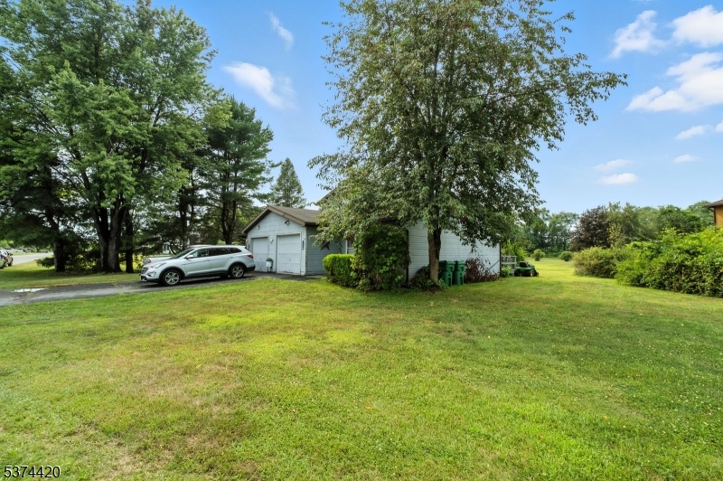 Large 2 Bedroom 2 Bathroom, w/ Attached Garage, Town-Home In Desirable High Point Country Club!!!  Attached Garage, High Ceiling, Open Floor Plan, Huge Deck & Much More!!!  Backs To Golf Course...Really A Must See!!!!  Clean & Ready To Move In ... Available August 1st