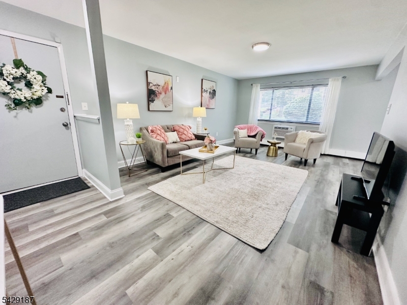 *THIS PROPERTY QUALIFIES FOR A COMMUNITY ADVANTAGE LOAN PROGRAM w/ LOWER INTEREST RATES (See Info Flyer in MEDIA). WELCOME to this Beautifully Updated 1 Bdrm, 1 Bth condo, conveniently located in the Regency Village complex, near shopping, dining and more! This 1st Floor, Spacious unit has been Freshly Painted, and is perfectly MOVE-IN READY. This is one of the Largest 1 Bedroom layouts in the development, and offers a practical, Open Floor Plan and a Gorgeous, White Kitchen with newer Stainless Steel Appliances - including a Gas Range. The Luxury Vinyl Plank Flooring throughout almost all of the unit, makes cleaning a breeze. Your Modernized Bathroom features a Walk-in, Glass-enclosed Shower and tasteful, Marble-look Tile. The Oversized Bedroom offers TWO, Double Closets for ample Storage - and the bedroom is large enough that you could create a small Office area in there as well. One Assigned Parking Space conveys with sale: #253 - situated directly across from the Rear Door to the building. Regency Village's many Amenities include a Swimming Pool, Picnic Area with Sun Umbrellas and Grills, Basketball Court, Playground area, and Laundry Rooms available in nearby Buildings. The $436/month HOA Fee INCLUDES: Heat, Hot Water, Trash, Snow Removal and Exterior Maintenance. Mandatory Pool Fee is $105 - but has already been paid for you by Seller.  Buyer must occupy unit for 2 Years, before Renting it. Development is not FHA Approved.
