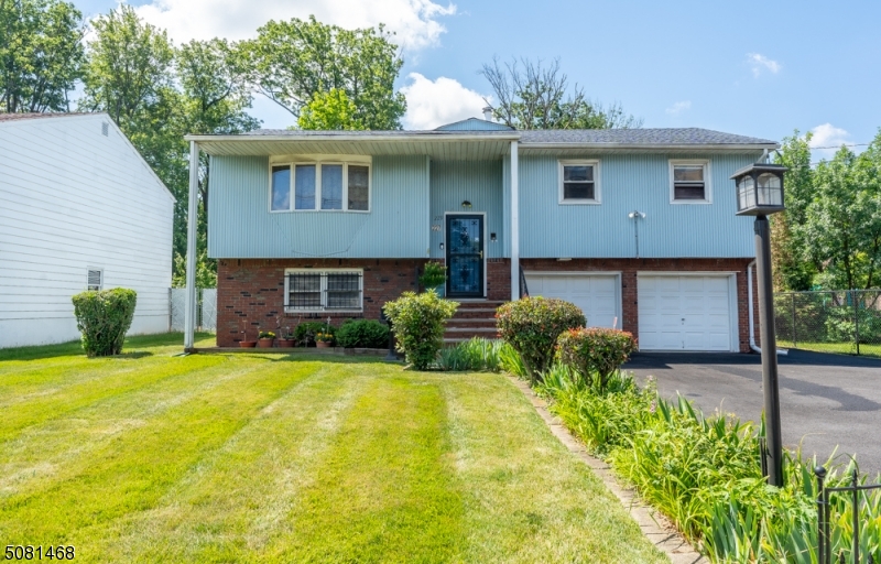 AMAZING! By-level in the heart of Roselle. This spacious property has 5 bedrooms, 3 full baths, mother and daughter option. The upstairs consists of living room, dining room, family room, eat in kitchen , 3 bedrooms, including the large master with full bath and an a additional bath. Downstairs, has two bedrooms, plus an office, huge family room, and full bath. Central AC. Property needs work so renovation loans or cash only. Huge lot and lots of possibilities.