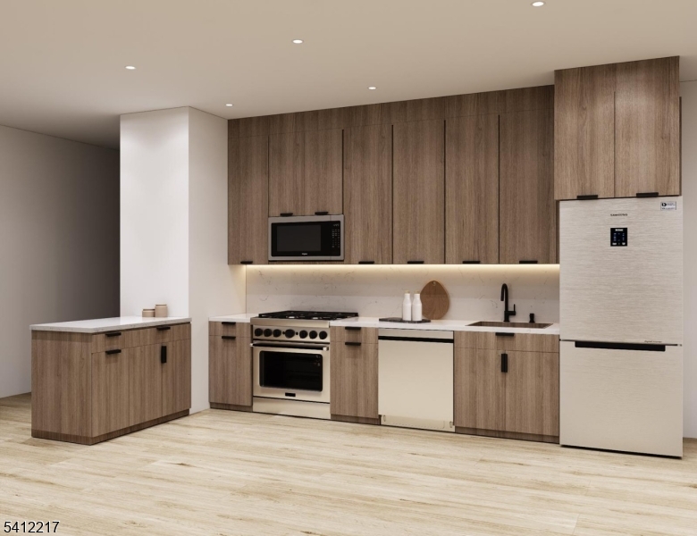 Welcome to your dream commuter haven! This stunning brand-new construction 1 bedroom, 1 bathroom apartment offers the perfect blend of modern convenience and sleek design just under a minute walk to the train station with direct service to NYC's Penn Station! Inside, enjoy thoughtfully designed living with high ceilings, expansive windows, and an open-concept layout that fills the space with natural light. The in-unit washer and dryer bring everyday convenience, while the chef's kitchen boasts modern finishes, stainless steel appliances, and quartz countertops. Each bedroom is spacious and bright, with ample closet space, and both bathrooms feature spa-inspired finishes. This luxurious building includes exclusive resident amenities like a fully equipped gym, stylish common lounge, and secure entry. Whether you're commuting to the city or working from home, this is urban-suburban living at its best have it all just minutes from Manhattan.Secure your dream home now exclusive early access to units at pre completion pricing. A limited opportunity to maximize both value and choice. Limited units available.
