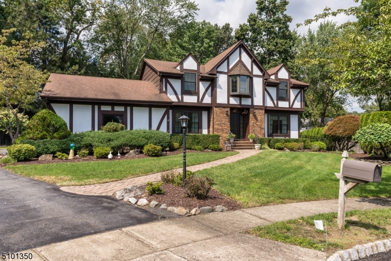 Fabulous cul de sac location for this 4 bedroom 2.5 bath colonial with finished basement, heated inground pool, paver walkway, and manicured landscaping.  Features you will love include an expanded kitchen with stainless steel appliances, new refrigerator, newer Bosch dishwasher, new gas oven, granite counters, and lots of storage.  Access the yard from either the kitchen or family room.  The family room features a brick  wood burning fireplace. Entertain either there or in the spacious living room. The master bedroom has huge walk-in organized closet and en suite newer bathroom with dual sinks and large shower.  The main bathroom has also been updated.  All bedrooms are a generous size.  You will love the private backyard with its inground pool and covered porch.