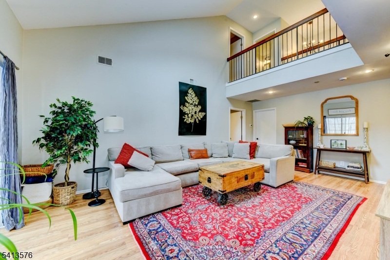 You will love the tranquil wooded views and exceptional privacy in this spacious 3-bedroom, 2.5-bath townhome one of the larger models in the highly sought-after Willow Walk community. This home sits in a prime location backing directly to the beautifully wooded Emmans Park, offering a peaceful natural backdrop from your deck and from nearly every window. The open floor plan features an updated, modern kitchen with white shaker cabinets, stainless steel appliances, a beautiful herringbone tile backsplash, under-cabinet lighting, newer counters, and updated flooring. All bathrooms have been renovated, including a standout primary bath with an expansive dual-sink vanity and a custom walk-in shower. The primary suite also features a generous walk-in closet. The main bath and powder room offer the same fresh, modern finishes. The large 2nd bedroom is like a second primary, with its own walk-in closet. Additional highlights include crown molding, vaulted ceilings with skylights, recessed lighting, abundant natural light, and excellent closet and storage space. The large third-floor storage room has been converted into a functional office ideal for today's lifestyle. Willow Walk has great amenities including a beautiful pool, sports courts, and playground. This pet-friendly community is conveniently located near shopping, dining, major commuting routes, and endless outdoor recreation.
