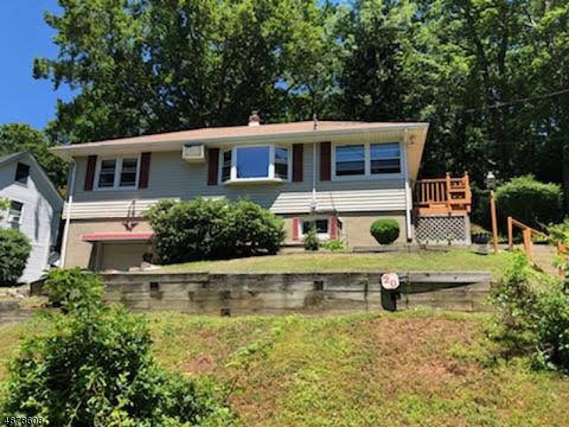 PRICE REDUCED,   "Live the Lake Life"  With a little imagination and TLC, this can be your new Lake Home. Located across from NJ's largest man made lake you can enjoy Lake views and Lake activities year round.  2 Bedroom 1 1/2 bath Ranch located just past Brady Bridge on Lake Hopatcong.  New septic will be completed by closing.  Don't pass this home by.  This can be your "Diamond in the Rough".