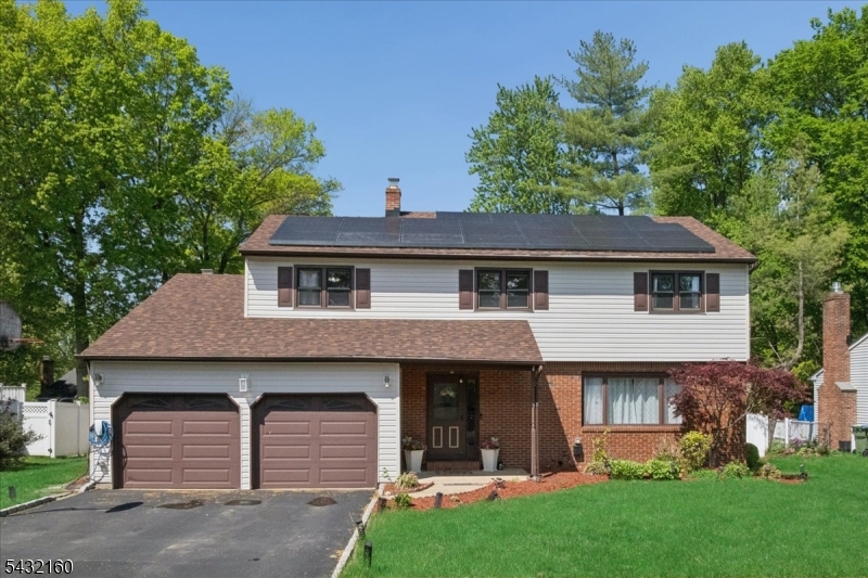 Nestled in the heart of highly sought-after North Edison, this beautifully updated 5-bedroom, 2.5-bath Colonial offers the perfect blend of timeless charm and modern upgrades all with a coveted east-facing orientation that floods the home with warm morning light.Step inside to find gleaming hardwood floors, an abundance of windows, and a bright, open layout designed for comfortable everyday living. The updated kitchen opens seamlessly to a sun-soaked family room, with sliders leading directly to your own backyard retreat. Outside a sprawling deck overlooks a professionally landscaped, park-like yard complete with a sparkling in-ground pool.The flexible floor plan includes a main-level bedroom, ideal for guests or a home office, plus four additional bedrooms upstairs. The finished basement adds even more versatile living space, perfect for a recreation room, home gym, or media area.Built for today's lifestyle, this home comes equipped with brand-new roof and siding, solar panels for energy savings, and an EV charging panel in the 2-car garage. Renovated kitchen and bathrooms complete the picture of move-in-ready comfort.Location doesn't get better than this. Just minutes from the Metropark NJ Transit Station for an easy NYC commute, and close to parks, shopping malls, and major highways. Zoned for the award-winning North Edison school district, including the prestigious J.P. Stevens High School.