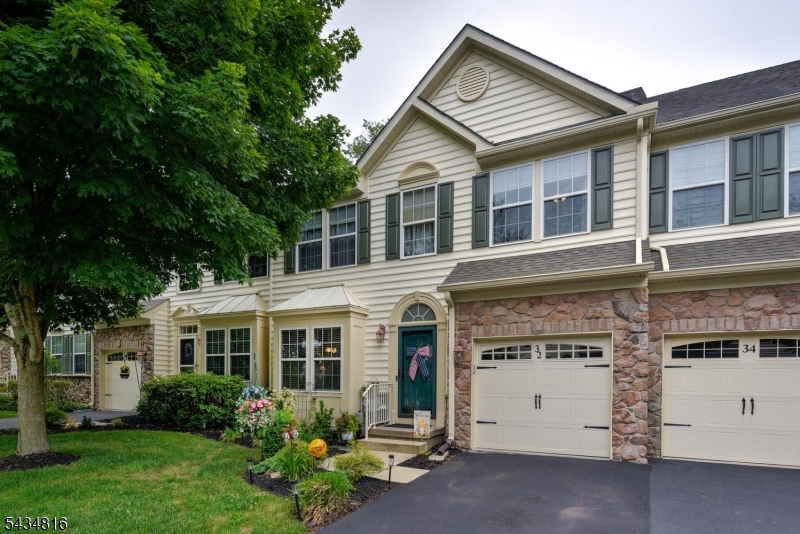 Welcome to the vibrant community of Hearthstone!  This exceptional 3-bedroom, 2 full and 2 half bath home  has been meticulously maintained & decorated to perfection.  Enter and be greeted by a soaring foyer & gleaming hardwood floors. The welcoming kitchen with recent stainless appliances, granite countertops, tile backsplash, under counter lighting, chair rail, new moldings & corbels at kitchen openings plus pendant lighting over sink is move-in ready.  The cozy breakfast room is perfect for morning coffee & bird watching. Proceed into the living rm/dining rm open concept featuring a gas fireplace w/mantle and recessed lighting offering a lovely gathering space. Step outside to a sunny patio & enjoy nature and a great spot for outdoor entertaining. Return inside to discover the first floor primary bedroom w/new carpet, custom walk-in closet and newly renovated en-suite bath w/new shower door, toilet, light, cabinet knobs & accessories.  The first floor laundry is steps from the kitchen offers ease and convenience.  Upstairs you will discover a great open loft perfect for a home office or lounging area plus new carpet throughout the second floor.  Two additional bedrooms & full bath offer privacy for guests.  You will be amazed at the sprawling finished basement recreational space w/half bath & storage rm featuring new Rheem HVAC '24, smart thermostat and hot water heater '23. Newly manicured landscaping plus 1 car garage complete this pristine home!  HIGHEST & BEST 6/7 NOON