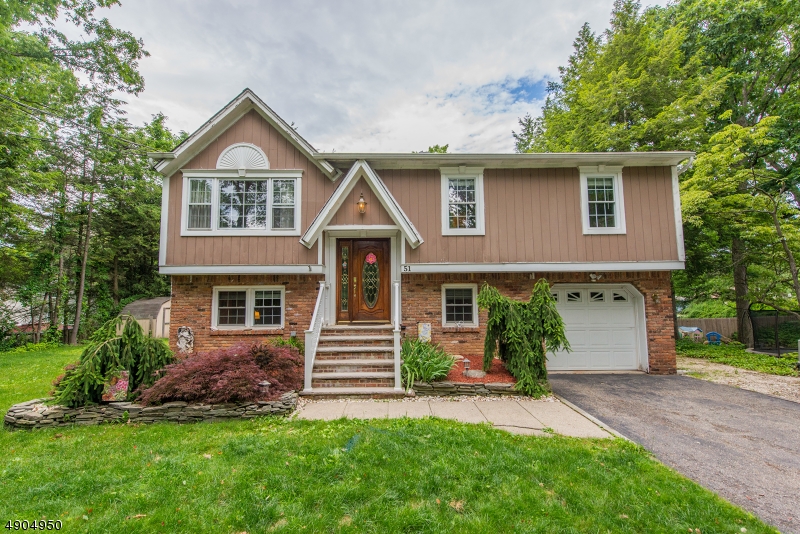 If you are seeking a solid home that is nicely updated, close to commute routes, near shopping and priced below $300k - this Brookwood beauty is the one for you! Not only is there an updated kitchen with granite counters, but from the dining area there is a terrific sun room with a deck for the grill. The rest of the upper level has hardwood floors plus a really nice full bath for the 3 bedrooms. The lower level has a large family room, an extra room for office or guest, convenient half bath, walkout to covered backyard patio, wood burning stove, laundry room, and entry to the garage. In addition, there's a generator hook-up, the roof is only 5 years old, the attic has lots of storage space, and the landscaping is beautiful. Enjoy the many lakes and parks available to you in Byram and peaceful Sussex County.