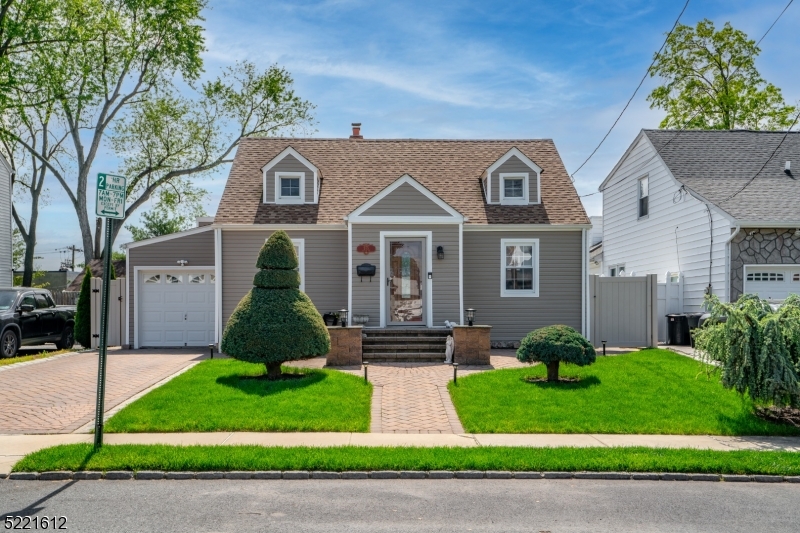 Indulge in the charm and elegance of this truly remarkable extended Cape Cod home. Boasting 3 bedrooms and 3 baths, this property offers a spacious and functional layout that is sure to meet your every need. The main level of the home greets you with a warm and inviting ambiance. Spacious living room with lots of natural light. Great well-appointed eat in kitchen, formal dining room, office, full bath are part of the 1st floor. The master suite, located on the main level, is a tranquil retreat. With its spacious layout and attached bath, it offers a private sanctuary where you can unwind and rejuvenate. Venture down to the lower level, and you'll discover a finished basement that adds even more living space to this already impressive home. Use this area to create a home theater, a recreation room, or a versatile space that caters to your unique lifestyle. Second floor with one bedroom and full bath. Step outside to the backyard oasis, where a beautifully designed paver patio awaits. This outdoor haven is perfect for hosting barbecues, enjoying morning coffee, or simply basking in the tranquility of nature. The meticulously maintained landscaping adds an extra touch of elegance to the property. Located in a sought-after area, this Cape Cod gem offers the best of both worlds peaceful living and easy access to nearby shopping centers, schools, and major transportation routes. Blocks away from train. Don't miss out on the opportunity to make this exquisite property your new home.