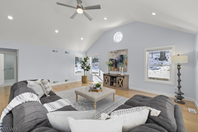 Experience the perfect blend of modern luxury and timeless charm in this beautifully reimagined custom-built home in the prestigious Short Hills. A transformative extension designed by renowned architect Thomas Baio in 2020 unveiled a sun-drenched majestic family-room with 12-foot vaulted ceilings, expansive oversized windows, a versatile home office/playroom, and a luxurious full bathroom all newly constructed. Also, the newly finished basement was added to enhance this magnificent home. With 4 spacious bedrooms, 3 full bathrooms, and an open-concept design, this home is ideal for elegant entertaining and comfortable living. The gourmet kitchen features granite countertops and new stainless steel appliances, seamlessly integrating into the dining and living areas. The inviting living room, anchored by a modern gas-burning fireplace, radiates warmth and sophistication, making it the perfect gathering spot. Outside, the expansive stone patio, upgraded barbecue area, and privacy trees create a serene oasis. Perfectly located near Deerfield Elementary within walking distance, buses to highly rated Millburn Middle School and High School and NJ Transit for easy NYC commutes, and close to Newark Airport, this home offers unmatched convenience. Recent updates include a new refrigerator, stove, garbage disposal, and washer/dryer, ensuring it is move-in ready in all aspects. This exquisite home delivers the ultimate style, comfort, and location for a lifestyle beyond compare.