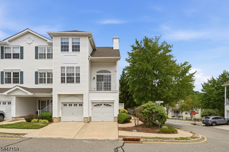 Welcome to 2 Timothy Court, a beautifully updated end-unit townhome in the highly sought-after Rose Arbor community of Morristown. This bright, open-concept 2-bedroom, 2.5-bath residence offers modern updates, low-maintenance living, and an unbeatable location. Sunlight pours through the windows, highlighting the hardwood floors installed throughout the home in 2022. The updated kitchen features new stainless steel appliances and flows seamlessly into the spacious living and dining areas, creating an ideal layout for both everyday living and entertaining. A renovated powder room completes the main level. Upstairs, the spacious primary suite boasts a beautifully renovated en-suite bath and spacious closet. A second-floor laundry room with a new washer and dryer adds everyday convenience exactly where you need it. Additional recent improvements include a new water filtration and softener system, new front door, new roof, and new skylights, offering peace of mind and exceptional value.Enjoy maintenance-free living in one of Morristown's most desirable townhouse communities, just minutes from vibrant downtown Morristown's award-winning restaurants, shopping, parks, nightlife, and NJ Transit with direct service to New York City. With easy access to major highways and countless recent upgrades, this move-in-ready home is a rare opportunity you won't want to miss.
