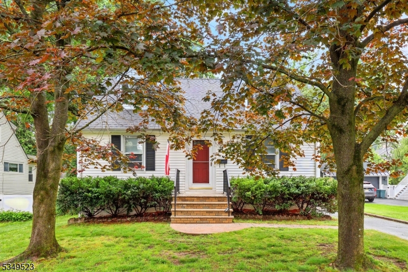 Cape Cod close to downtown Morristown and close to Rts. 287, 80 and 24.  Features include newer front porch, hardwood flooring, living room with custom built-ins, 2 first floor bedrooms and full bath, kitchen with maple cabinets, stainless steel appliances including gas range, dishwasher, microwave oven and refrigerator.  Second floor features spacious primary suite with full bath.  Finished basement with recessed lighting, full bath and laundry with washer, dryer and utility sink.  Off street parking with paved driveway, 2 car detached garage, large deck, level yard and lots of extra parking, fully fenced yard. Roof new in 2018 and ductless split air conditioning units throughout the home, new appliances in 2020, new hi-efficiency boiler and renovated basement bath in 2021, washer and dryer in 2022 and dishwasher in 2024..