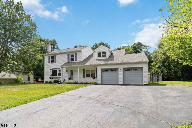 This beautiful 4-bedroom Colonial offers the perfect blend of comfort, space, and functionality. The main level features a spacious living room, formal dining room, and well-appointed kitchen, providing an ideal layout for everyday living and entertaining. Just a few steps down, you'll find a welcoming family room with direct access to the expansive, level backyard. Outdoor living is a standout feature of this property, with a large patio complete with a built-in fireplace perfect for relaxing or hosting gatherings. The backyard also includes three sheds, one of which is currently being used as a workshop, offering ample storage and workspace options. Upstairs, you'll find three generously sized bedrooms and a full bathroom. At the end of the hall, the spacious primary suite provides a private retreat with its own full bathroom. Located in a desirable neighborhood with a convenient location, this home offers the space, amenities, and setting you've been looking for.