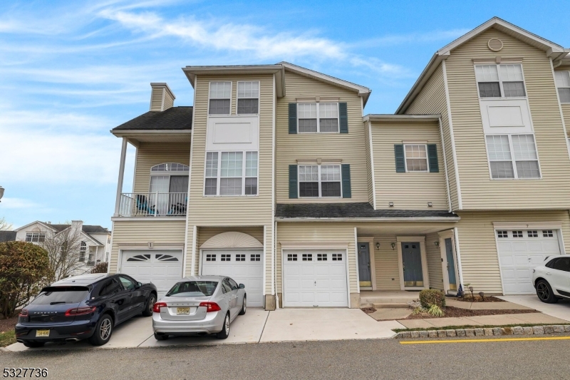 With a location just minutes from vibrant Morristown's restaurants, theaters, parks, and music scene, this townhouse is priced for today's market and move-in ready. Discover your dream home in Rose Arbor, Morris Twp! This end-unit townhome offers vaulted ceilings, an open floor plan, a gas fireplace in living room and an abundance of natural light from its many windows. The eat-in kitchen opens to a personal patio, perfect for relaxing with your morning coffee. Freshly painted from top to bottom, it features brand-new carpeting, a basement with new vinyl plank flooring, and a 2024-installed central air unit and FHA system. All applicances are included and the unit is serviced with city water and sewer. The primary bedroom offers a walk-in closet and en-suite bath, while the secondary bedroom also boasts a walk-in closet and private bath. Conveniently, the washer and dryer are located in the second-floor hallway. There is a one car garage plus common off-street parking in the complex. Don't Wait!