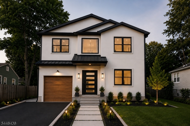 Welcome to this newly beautifully crafted home, where modern design meets everyday comfort. You enter into a dramatic two-story foyer. Rich wide-plank red oak hardwood floors flow through the open-concept main level, connecting a chef-inspired kitchen to a warm, light-filled family room. The kitchen impresses with two-tone cabinetry, a marble waterfall island, stainless steel appliances, and open wood shelving. The adjoining family room centers around a sleek linear gas fireplace framed by an accent wall, with large sliding glass doors bringing in natural light and backyard views. A stylish powder room with checkerboard tile flooring completes the main level conveniences. Upstairs, the master suite is a true retreat, featuring a vaulted or 3D ceiling, an accent wall, an expansive custom walk-in closet, and a spa-like ensuite with a freestanding soaking tub, double vanity, and a glass-enclosed shower. Four additional generously sized bedrooms and Anderson windows throughout. The finished basement offers a versatile, open recreation space, ready for lifestyle customization. A finished garage with interior access rounds out the home's practical features. Outside, the home showcases classic curb appeal with crisp white stucco, black-trimmed windows, a black metal roof accent, and a professionally landscaped front, all just moments from schools, parks/Garret Mt, major highways, and MSU. Take advantage now, while property is still under construction, and pick your finishes!