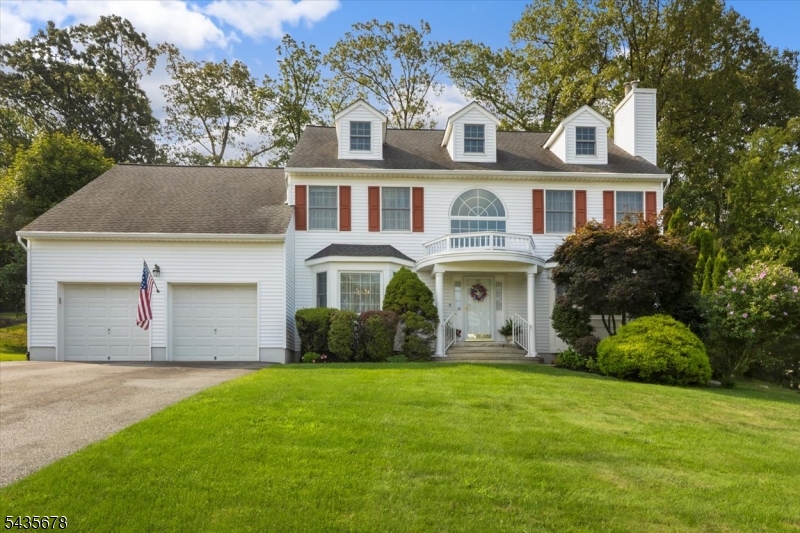 Welcome to this beautifully maintained 5-bedroom, 3-full-bath Colonial nestled in a highly sought-after, pristine neighborhood. Offering the perfect blend of comfort, functionality, and space, this home is designed to accommodate today's lifestyle. The heart of the home is the spacious center-island eat-in kitchen, featuring ample cabinetry, generous counter space, and a slider leading to a private deck, perfect for outdoor dining, entertaining, or simply relaxing. The kitchen flows seamlessly into the great room, while the formal dining room and elegant living room with a Heatilator fireplace provide ideal spaces for both everyday living and special gatherings. A first-floor bedroom located adjacent to a full bath offers excellent flexibility for guests, or an in-law suite. A convenient main-level laundry room adds to the home's practical design. Upstairs, the spacious primary suite features a private full bath and exceptional closet space rarely found in homes of this style. Three additional generously sized bedrooms are serviced by another full bath. A walk-up attic provides abundant storage and future expansion possibilities. Additional highlights include a partially finished basement offering extra living or recreation space, a large utility/storage room, central air conditioning, house generator and a two-car garage. This exceptional home combines generous living space, thoughtful design, and a desirable location making it a true must-see for today's discerning buyer.
