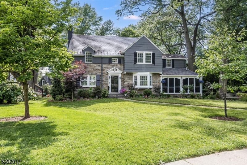 Amazing opportunity to experience living on 'the Crescents'. Close to Memorial Park, Maplewood Village, and trains to NYC - this location is prime. This center hall colonial has plenty of space for everyone. The living room features wood-burning fireplace and triple exposure for maximum light. The dining room is immediately adjacent to the STUNNING kitchen featuring high-end Miele and Subzero appliances including double wall ovens and double dishwashers for effortless entertaining. Quartz countertops, walnut topped island, and tons of integrated storage make this kitchen a dream. A first floor en-suite bedroom is ideal for guests / au pair. First floor powder room provides convenience. The screened-in porch out front, and large back deck provide multiple options for indoor/outdoor living and take full advantage of the serene, landscaped property. Upstairs on the second floor are three generous bedrooms and two full baths. The primary en-suite features an add'l large sitting room for an ideal WFH option. Downstairs there is a fabulous rec room with tall ceilings, surround sound Dolby Atmos system  and 75  4K TV. Basement powder room and access to attached garage for modern convenience. Biz-grade wifi & hard-wired ethernet for optimal internet.