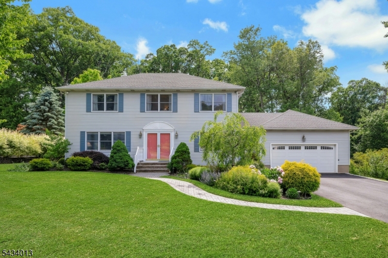 Pride of homeownership shines in every room of this IMMACULATE 4 bedroom/3 full bath center hall colonial set on a quiet street. Meticulously maintained and loved over the years, you will be captivated by the curb appeal, the beautiful front yard landscaping and the inviting entrance. Large windows in the living room and formal dining room create a cheery environment which is echoed in the eat-in kitchen and comfortable family room, both overlooking a fabulous deck and a gorgeous private back yard with a shed. The first floor is completed by a full bathroom with a shower and a bright laundry room as well as access to an oversized 2-car garage with attic storage. The second floor offers a generous primary suite with its own full bath and plenty of storage. Spacious closet space is also to be found in the additional 3 bedrooms accessed from a wide landing. The hallway bath presents a tub with shower. The basement is partially finished and comes with a work bench and shelving. The charming back deck and beautiful property are perfect for relaxing or fun gatherings - there's plenty of room for everyone! Randolph is well known for being a wonderful community and offers great commuting options. Make this fabulous home the start of new memories!