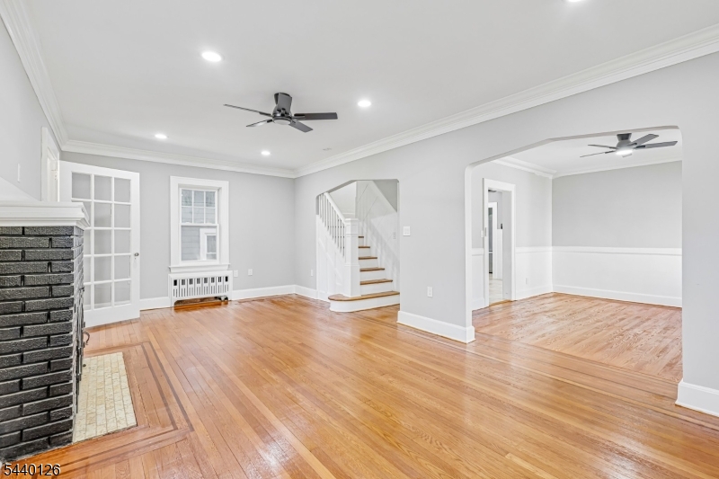 This beautifully updated Tudor-style home in sought-after Roselle Park offers a great mix of modern touches, functional space, and commuter-friendly convenience. Move-in ready, it features 3 spacious bedrooms, 2.5 bathrooms, spacious living areas, and a finished attic bonus room perfect for a home office, guest space, playroom, or flex area. The finished basement boasts a summer kitchen, adding even more space for living and entertaining. Other highlights include a dedicated laundry room, two-car garage, private driveway, and a roomy layout throughout. Just a short walk to NJ Transit with direct access to New York City, and close to shopping, dining, parks, schools, and major highways, this is a rare chance to own a home with charm, space, and modern convenience in one of Union County?s best locations.