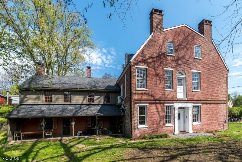 Welcome to the Historic Hixson-Mixsell house also known as the Springtown Stagecoach Inn,an extraordinary property where American history & refined country living converge.The rear wing,dating to circa 1750,and the stately Georgian circa 1825 together form a residence of remarkable provenance.Recognized as one of NJ's possible Underground Railroad sites,on the National Register of Historic Places (2014),this is a home of rare significance.Set along the tranquil, trout-stocked Pohatcong Creek,the property offers an idyllic natural setting with immediate access to fishing &area hiking, cycling and Delaware River recreation.Thoughtfully restored between 1992 and 2024,the residence encompasses 16 rms enriched by 9 fireplaces,original pumpkin pine flrs.detailed trim,deep set window sills with high ceilings. Great architectural details.The 1st flr 1750's section offers a living room,dining room,galley kitchen with a breakfast rm,all accented with fireplaces.The1825 formal living rm and "Tavern Room" creates an elegant, inviting setting for entertaining.2nd flr 1750's private primary suite features an en-suite bathrm and sweet sitting room with its own bath.The 1825 addition offers four other generously proportioned, flexible spaces and 3rd level provides 4 further airy rooms & hall bath.Remarkable historic Underground Railroad sanctuary in attic area.90 minutes to NYC/ Philly.You will cherish this distinguished country house of timeless beauty&heritage for generations to come.