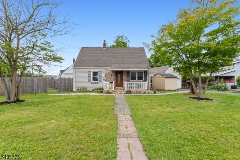 Welcome to this beautifully updated and maintained 3-bedroom Cape cod style home nestled in the Haskell section of Wanaque! From the moment you enter, you'll appreciate the perfect blend of charm, comfort, and modern updates that make this home truly stand out. Step inside to discover spacious sun-filled living areas complemented by gorgeous hardwood floors throughout, creating a warm and inviting atmosphere ideal for everyday living. First floor features a nice sized living room, an updated eat in kitchen, first floor bedroom, your full bathroom, and a walkway that takes you to the big 2 car attached garage. Car enthusiasts and those in need of extra storage will love the oversized attached garage, while the expansive 4 car driveway provides exceptional convenience. Step outside to your own private backyard retreat featuring a fully fenced in yard with plenty of space to relax, entertain, or play. Surrounded by privacy fencing, the outdoor space offers the perfect setting for summer gatherings, pets, gardening, or simply enjoying peaceful evenings in complete comfort. Perfectly located near shopping, dining, parks, and everyday conveniences, this home also sits just moments from a nearby dog park, making it ideal for outdoor lovers and pet owners alike. Don't miss the opportunity to own this exceptional home in one of Wanaque's most desirable neighborhoods!