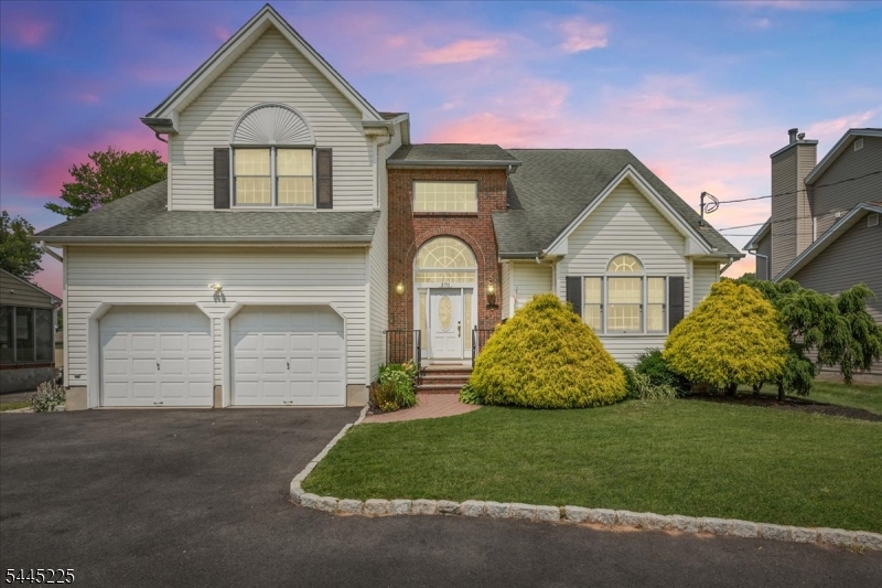 Exceptional space, modern updates, and a prime Clark location come together in this impressive 5-bedroom Colonial. Built in 2001 and lovingly cared for by its current owners, this home offers nearly every feature today's buyers are looking for.Designed for both comfortable everyday living and effortless entertaining, the main level features an inviting open floor plan anchored by a beautifully renovated kitchen with quartz countertops, stainless steel appliances, and a center breakfast bar. The kitchen flows seamlessly into the sun-filled family room with a gas fireplace, creating a warm and welcoming gathering space. Formal living and dining rooms provide additional areas for hosting holidays and special occasions, while a convenient first-floor laundry room adds everyday functionality.The second floor offers five generously sized bedrooms, including a spacious primary retreat with a walk-in closet and a private bath featuring a soaking Jacuzzi tub and separate shower.Outdoor living is just as inviting with a  deck, patio, and an expansive, level backyard offering endless possibilities for recreation, gardening, or future enhancements. A circular driveway and attached two-car garage complete the home's exceptional curb appeal. Conveniently located near Clark's schools, parks, recreation facilities, library, shopping, and major commuting routes, this move-in-ready home offers the perfect combination of space, comfort, and convenience.