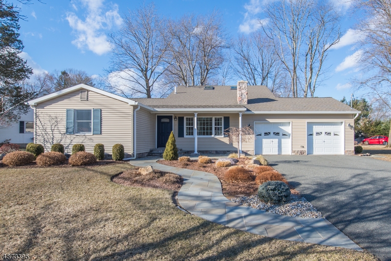 Dreaming the perfect dream home? Enjoy all the advantages of 1 floor living+ 2nd Fl.Grand Master. Curb appeal +. Walk into formal LR w/WB fireplace. Updated kitchen features granite counters, SS, HW. Travertine Backsplash, SS Appliances. DR shines w/wall of windows overlooking fenced in backyard & patio! FR offers addtl room to fit your lifestyle! Perfect for entertaining. Gleaming HW floors & crown molding throughout. 3 comfortable bdrms complete 1st level- newer carpet. 2nd floor Mstr bdrm showcase- high ceilings, skylights & walk-in closet. En-Suite newly renovated in 2017 w/granite & oversized glass shower. 2 car garage, plenty of parking. Beautifully landscaped/ UG sprinklers. All located in welcoming Rock Ridge Lake community. Short proximity to Downtown, NYC-Direct transpo, hwys, parks & TOP schools.