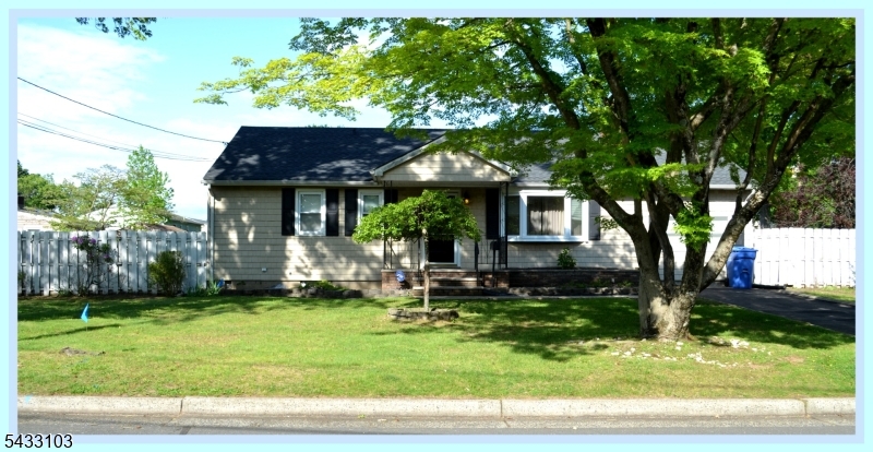 Welcome to this inviting 3-bedroom ranch offering comfort, convenience, and a location that truly stands out. A charming front entrance overhang and welcoming porch create great curb appeal from the moment you arrive. Ideally situated near the elementary school, major roadways, public transportation, dining, and recreation, this home also enjoys close proximity to Spring Lake Park for outdoor enjoyment. Inside, you'll find hardwood floors throughout, fireplace, a spacious eat-in kitchen with a garden window, and a separate dining area perfect for hosting large gatherings and everyday living. The full basement, partially finished, offers additional flexible space for recreation, storage, or a home office. Step outside to a rear fenced yard featuring a patio and plenty of room for summer entertaining, gardening, or relaxing outdoors. This home combines warmth, and convenience in one desirable package.