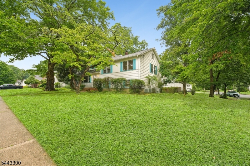 Offered for the first time, this home presents a rare opportunity to create something truly exceptional in one of Morristown's most desirable neighborhoods. Situated on a prominent corner lot directly across from Lidgerwood Park and just four blocks from vibrant South Street, the location offers convenient access to parks, recreation, dining, shopping, and Morristown's renowned downtown amenities.  Inside, generous living spaces include 5 bedrooms, 2.5 baths, a bright recreation room, and a thoughtfully designed addition offering exceptional flexibility. The addition offers the possibility for and for a spacious primary suite, home office, studio, or expanded living area. A one-car garage, whole-house generator, and abundant natural light enhance everyday comfort and convenience. Bring your vision and unlock the full potential of this well-loved home. With an unbeatable location convenient to NJ Transit, routes I-80, I-287,and 24 this is a commuter's dream with endless opportunities to personalize, this is a rare chance to create a home that reflects your own style.