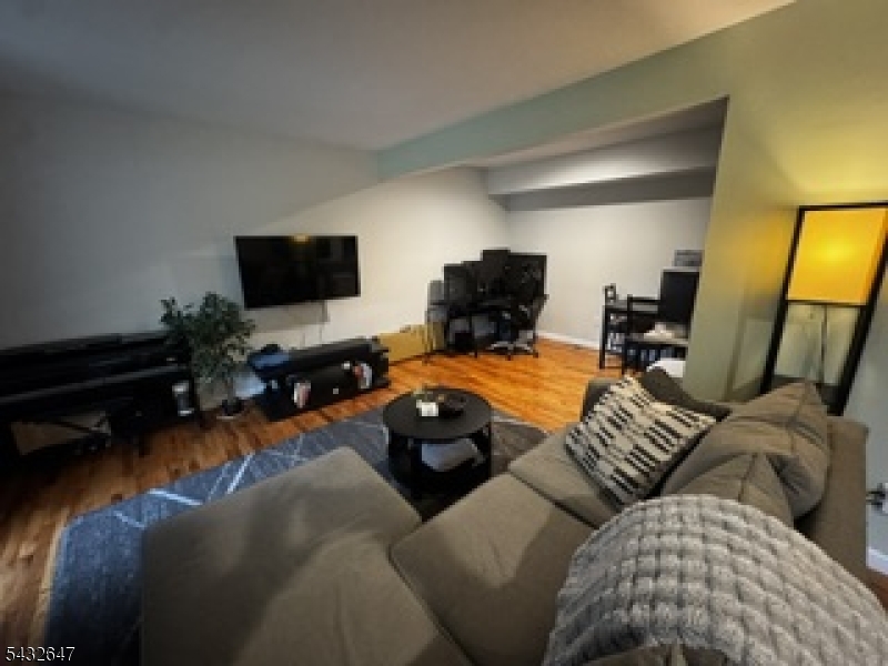 This first-floor Cedarbrook condominium is properly situated towards the end of the D building of units. An inviting home with a functional layout. The galley style kitchen offers restored cabinets. Bedroom features a walk-in closet area. Wood flooring is maintained in good condition. The complex offers an outdoor pool, barbecue area, and park bench styled seating. Complex is located just minutes from the Morris Plains Train Station as well as major highways such as Routes 10 and 287. Property is a Morris Plains mailing address, but actually is situate in Parsippany-Troy Hills. Don't wait on this one!