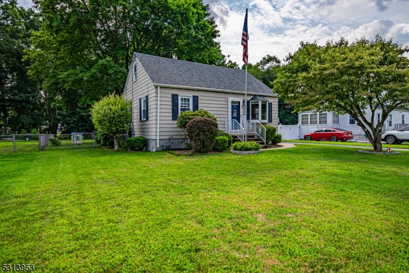 Welcome to your ideal 4 Bedroom, 2 Bathroom Cape Cod nestled on a flat lot in a peaceful neighborhood in Mine Hill. Upon entering, you're greeted by newly refinished wood floors throughout the home with an open layout in the kitchen and living room. The kitchen has brand new countertops, backsplash, young stainless steel appliances, and new laminate flooring. The main floor also features 2 spacious bedrooms (one currently being used as a dining room) and a full bathroom as well as an enclosed porch on the side of the house that's so serene. The porch leads to a patio for outdoor entertaining in the fenced in flat yard. Back inside, the second floor features two bedrooms and a fully renovated bathroom(2022). Full unfinished basement offers tons of storage and your hook ups for laundry and utilities. Young roof, gas furnace, central air conditioning, hot water heater (all 2018). Home is on public water and natural gas. This prime location offers easy access to Route 10, 46, and 80, and is conveniently close to Mine Hill Beach. Don't miss your chance to make this house your home!