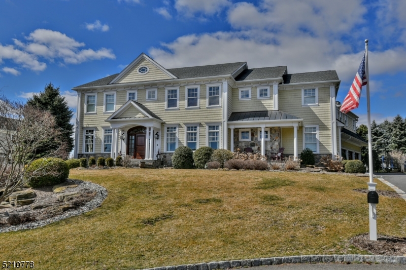 Spectacular Home in Wyckoff!! This is one of the most desirable lots in Sicomac- perched on a knoll w/amazing sunset views, this young home is perfection w/an amazing layout on all 3 floors, high-end products and workmanship throughout.The grand 2-story Foyer w/rotunda and raised panels sets the stage for this beauty including the luxurious dining room, warm library/Living Room, inviting family room that opens to the Gourmet Kitchen. The High-end Kitchen includes a Pantry and Butler's Pantry. The 1st floor also has a guest room/office, full bath, pr, and oversized mudroom w/lockers. The deluxe Primary suite is a dream w/sitting room w/FPL, Marble bathroom and custom closets. Enjoy all the basement has to offer - gym, recreational area, custom wine room and club-like lounge, Fbath + office/rm. The park-like backyard is lush, flat and private, has a great patio w/outdoor kitchen + pergola. The 3-car attached garage also has a car lift! Not a detail was missed - Too much to list!